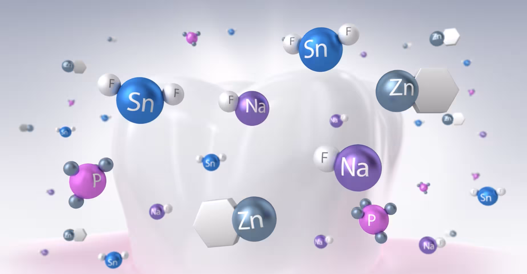 Tooth surrounded by floating mineral and antibacterial particles labeled Sn, Zn, Na, F, and P.