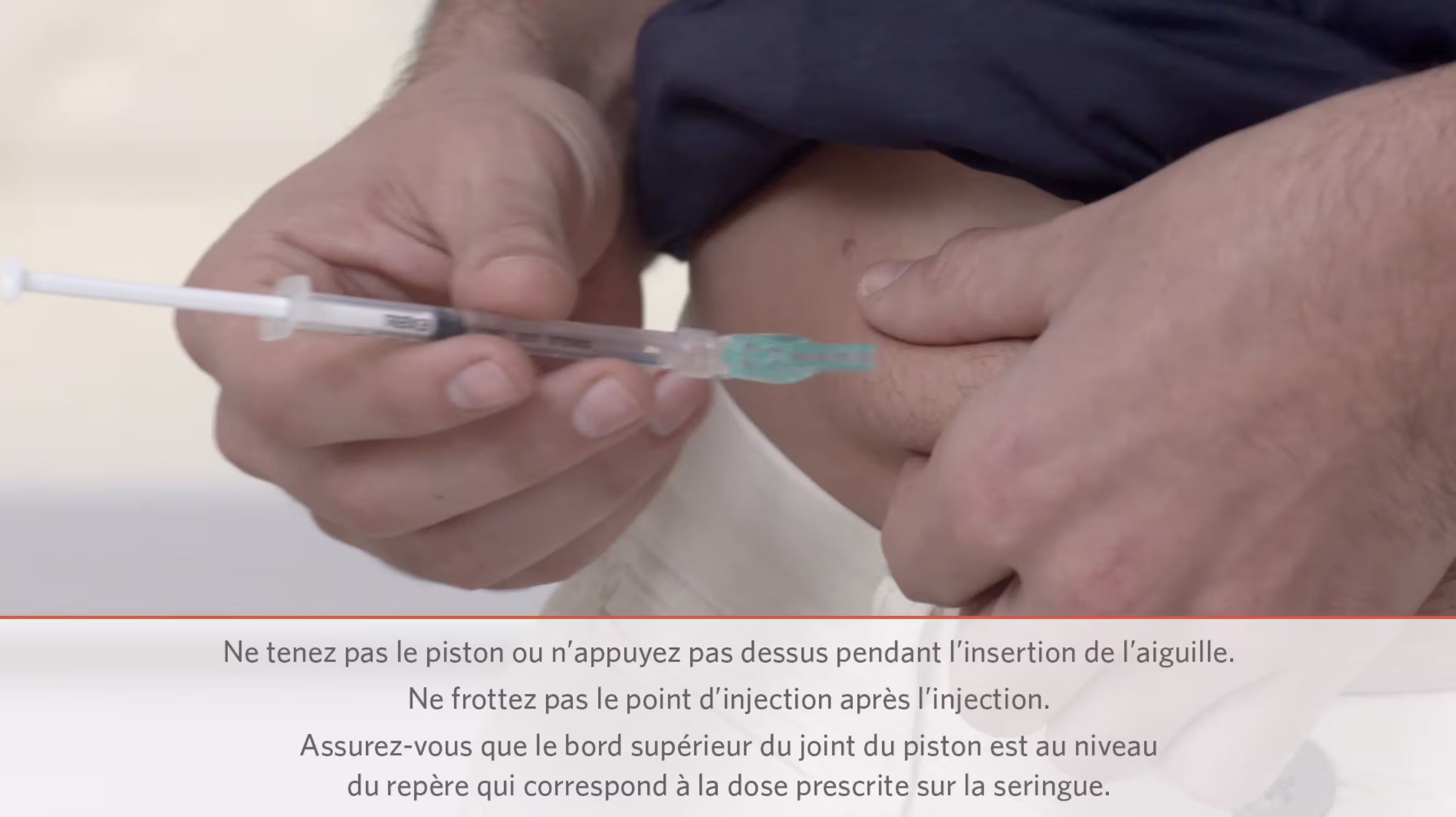 Close-up of a person inserting a needle into their abdomen for a self-administered injection.